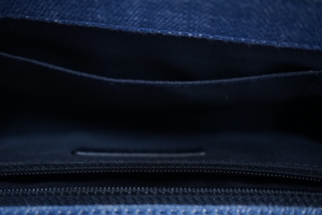 A Chanel denim cheveron flap shoulder bag with silver hardware, date code 20845697, 28cm wide